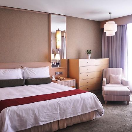 Hotel Nikko Tianjin Extérieur photo A bedroom at the hotel